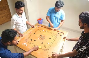 The Jouleslabs development team engaging in indoor games, highlighting the balanced work environment of a premier SaaS and AI development service provider.