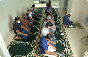 The Jouleslabs team practicing daily prayer together, reflecting the strong values and inclusive culture of our production-grade SaaS and AI development firm.